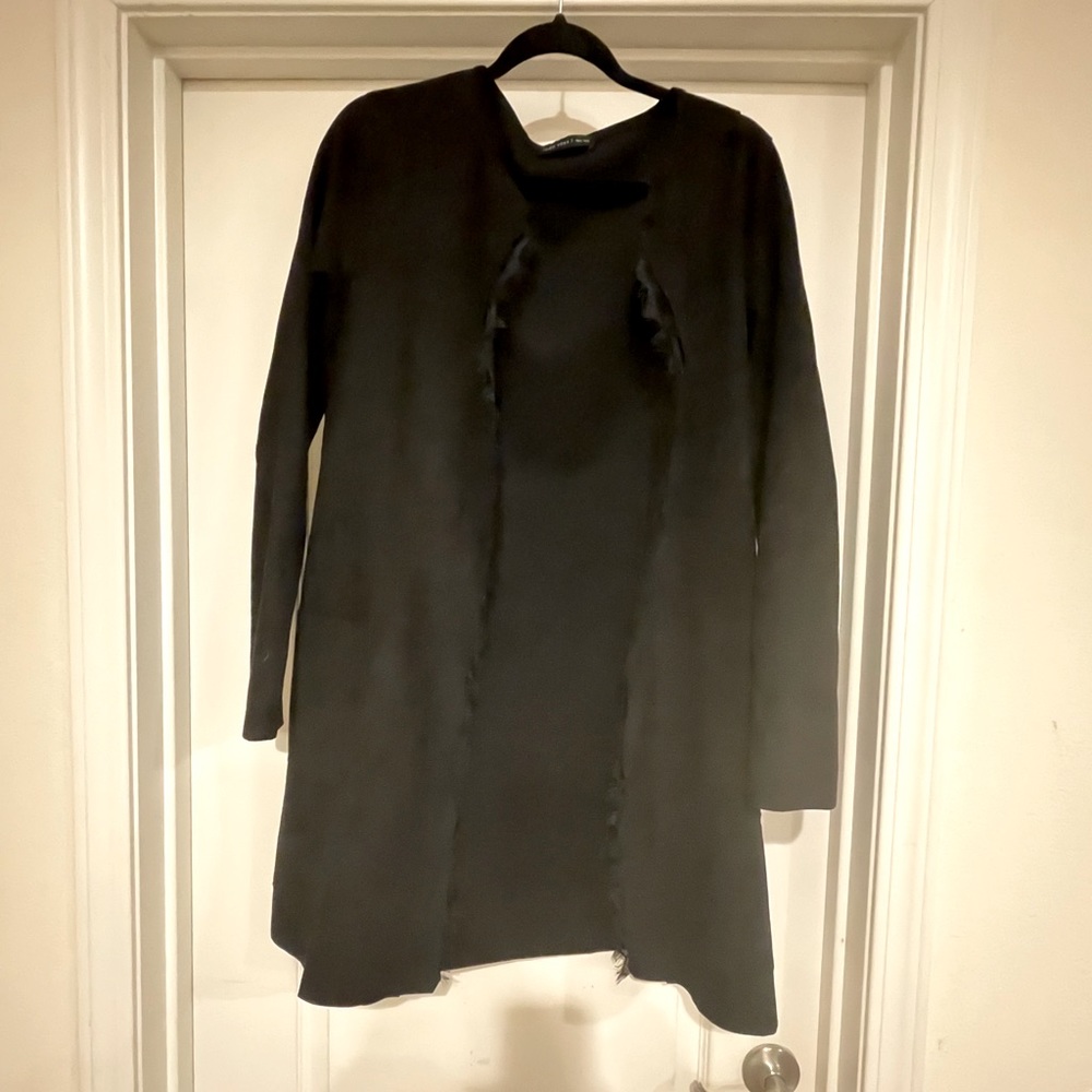 black coat, lace trim.